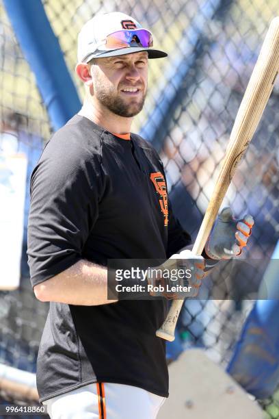 Evan Longoria of the San Francisco Giants looks on before the game against the Los Angeles Dodgers at Dodger Stadium on Thursday, March 29, 2018 in...