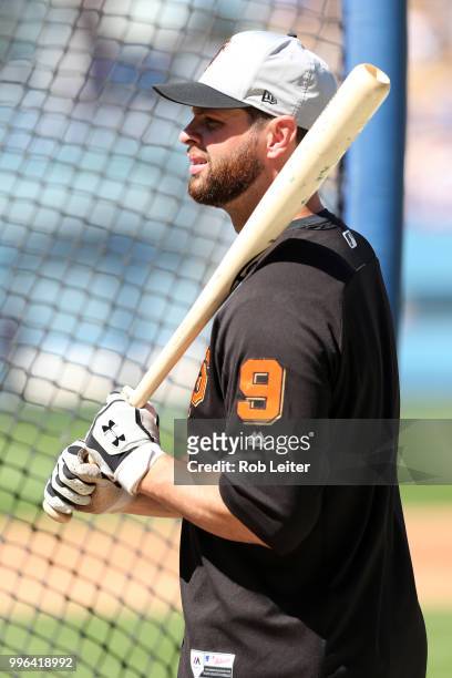 Brandon Belt of the San Francisco Giants looks on before the game against the Los Angeles Dodgers at Dodger Stadium on Thursday, March 29, 2018 in...