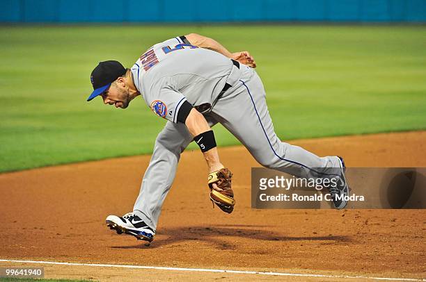 David Wright of the New York Mets fields a ball during a MLB game against the Florida Marlins in Sun Life Stadium on May 14, 2010 in Miami, Florida.