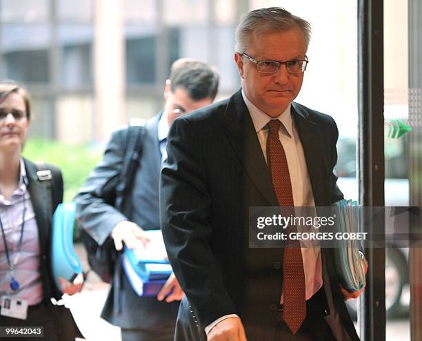 Commissioner for Economic and Monetary Affairs Olli Rehn arrives on May 17, 2010 to attend an Eurogroup meeting at the EU headquarters in Brussels....