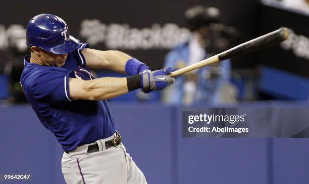 Michael Young of the Texas Rangers swings at a pitch during a MLB game against the Toronto Blue Jays at the Rogers Centre May 15, 2010 in Toronto,...