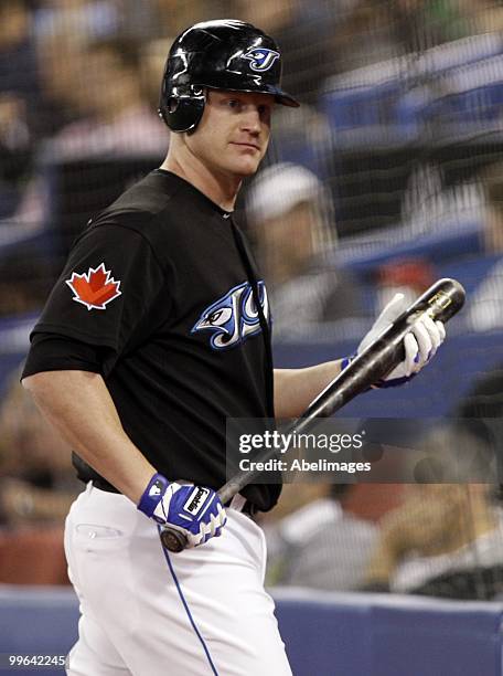 Lyle Overbay of the Toronto Blue Jays walks to the bench while playing the Texas Rangers during a MLB game at the Rogers Centre May 15, 2010 in...