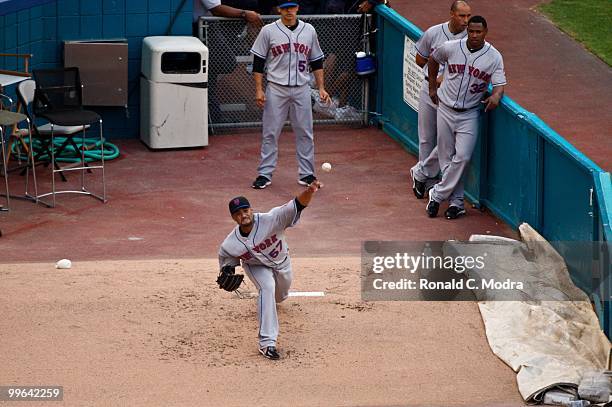 Pitcher Johan Santana of the New York Mets warms up before a MLB game against the Florida Marlins in Sun Life Stadium on May 13, 2010 in Miami,...