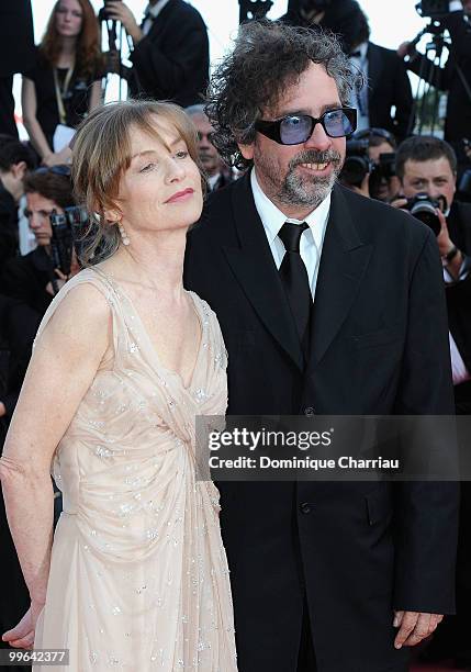 Actress Isabelle Huppert and director and president of the jury Tim Burton attend the premiere of 'Biutiful' held at the Palais des Festivals during...