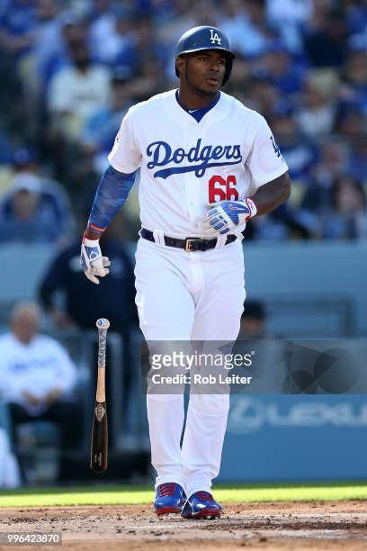 Yasiel Puig of the Los Angeles Dodgers bats during the game against the San Francisco Giants at Dodger Stadium on Thursday, March 29, 2018 in Los...