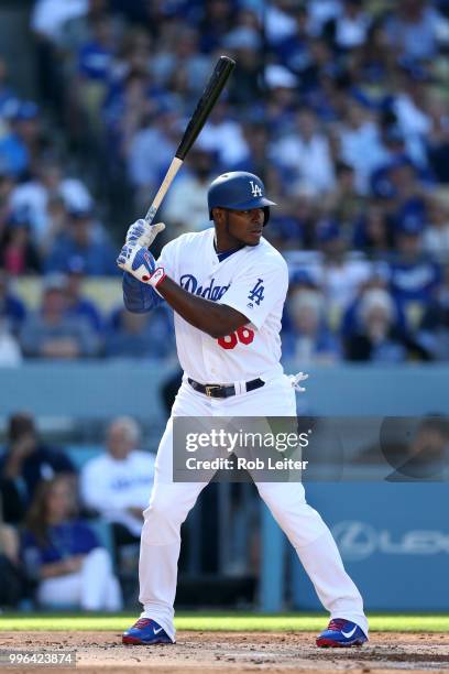 Yasiel Puig of the Los Angeles Dodgers bats during the game against the San Francisco Giants at Dodger Stadium on Thursday, March 29, 2018 in Los...