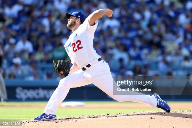 Clayton Kershaw of the Los Angeles Dodgers pitches during the game against the San Francisco Giants at Dodger Stadium on Thursday, March 29, 2018 in...