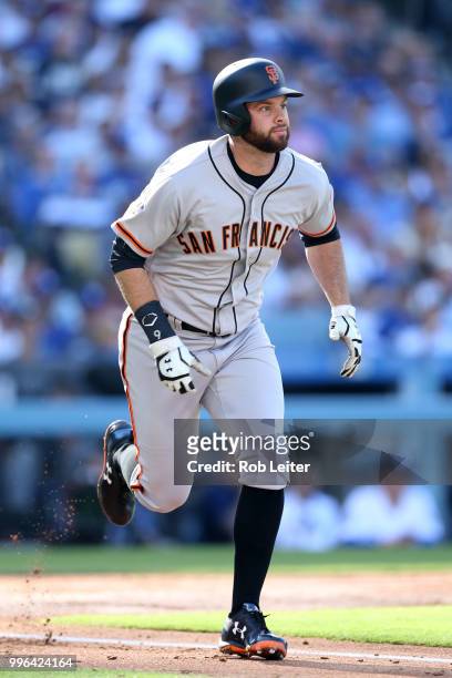 Brandon Belt of the San Francisco Giants runs during the game against the Los Angeles Dodgers at Dodger Stadium on Thursday, March 29, 2018 in Los...