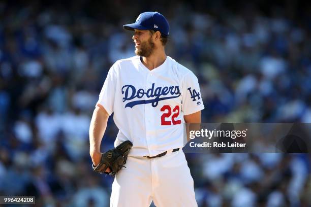 Clayton Kershaw of the Los Angeles Dodgers pitches during the game against the San Francisco Giants at Dodger Stadium on Thursday, March 29, 2018 in...