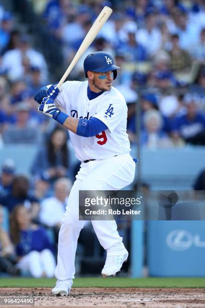 Yasmani Grandal of the Los Angeles Dodgers bats during the game against the San Francisco Giants at Dodger Stadium on Thursday, March 29, 2018 in Los...