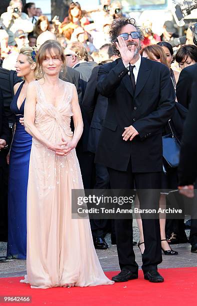 Actress Isabelle Huppert and director and president of the jury Tim Burton attend the premiere of 'Biutiful' held at the Palais des Festivals during...