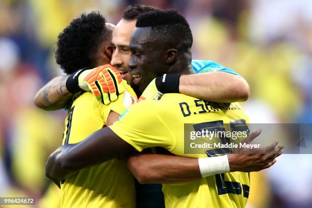 June 28: David Ospina of Colombia, Johan Mojica of Colombia, and Davinson Sanchez of Colombia celebrate following their sides victory in the 2018...