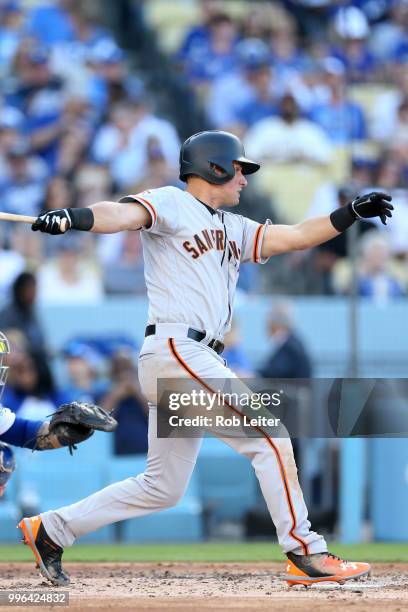 Joe Panik of the San Francisco Giants bats during the game against the Los Angeles Dodgers at Dodger Stadium on Thursday, March 29, 2018 in Los...