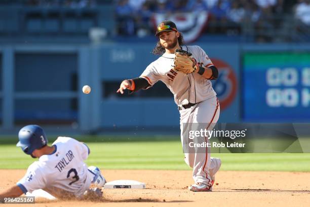 Brandon Crawford of the San Francisco Giants plays the field during the game against the Los Angeles Dodgers at Dodger Stadium on Thursday, March 29,...