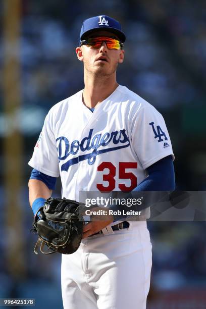 Cody Bellinger of the Los Angeles Dodgers looks on during the game against the San Francisco Giants at Dodger Stadium on Thursday, March 29, 2018 in...