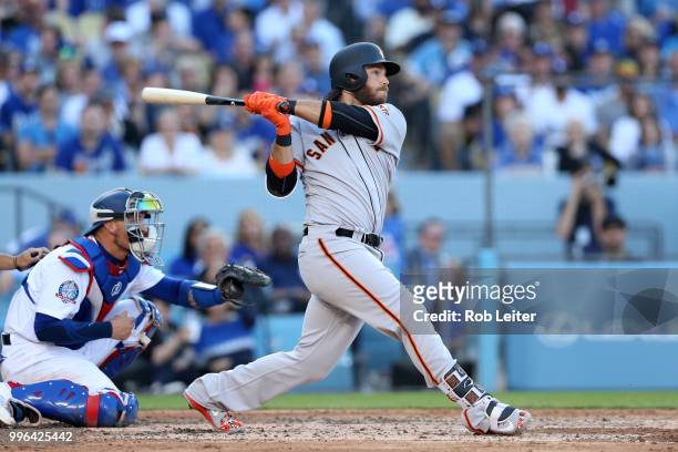 Brandon Crawford of the San Francisco Giants bats during the game against the Los Angeles Dodgers at Dodger Stadium on Thursday, March 29, 2018 in...