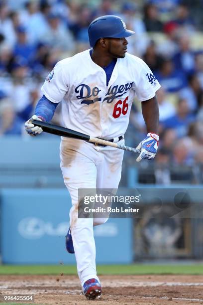 Yasiel Puig of the Los Angeles Dodgers bats during the game against the San Francisco Giants at Dodger Stadium on Thursday, March 29, 2018 in Los...