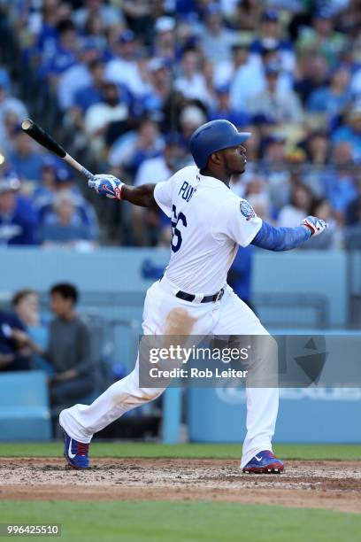 Yasiel Puig of the Los Angeles Dodgers bats during the game against the San Francisco Giants at Dodger Stadium on Thursday, March 29, 2018 in Los...