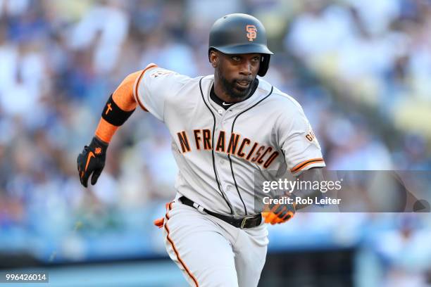 Andrew McCutchen of the San Francisco Giants runs during the game against the Los Angeles Dodgers at Dodger Stadium on Thursday, March 29, 2018 in...