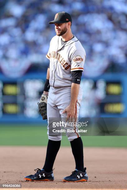Brandon Belt of the San Francisco Giants looks on during the game against the Los Angeles Dodgers at Dodger Stadium on Thursday, March 29, 2018 in...