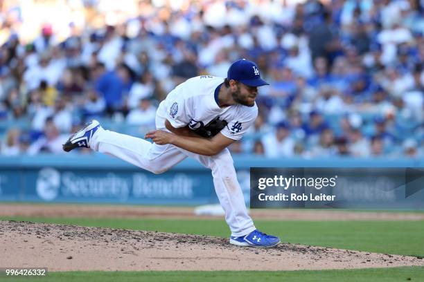 Clayton Kershaw of the Los Angeles Dodgers pitches during the game against the San Francisco Giants at Dodger Stadium on Thursday, March 29, 2018 in...
