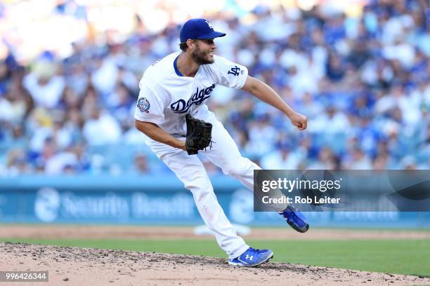 Clayton Kershaw of the Los Angeles Dodgers pitches during the game against the San Francisco Giants at Dodger Stadium on Thursday, March 29, 2018 in...