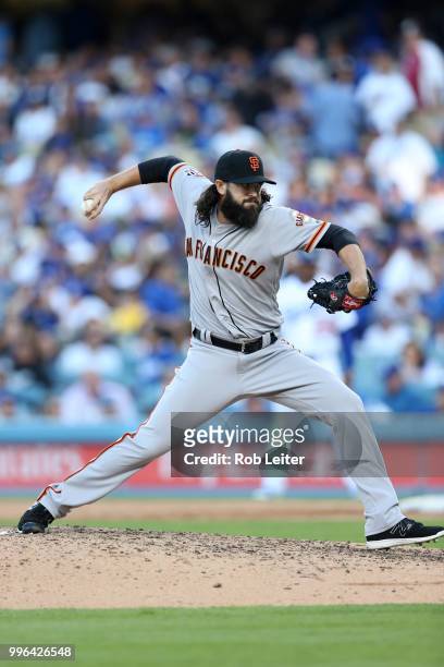 Cory Gearrin of the San Francisco Giants pitches during the game against the Los Angeles Dodgers at Dodger Stadium on Thursday, March 29, 2018 in Los...