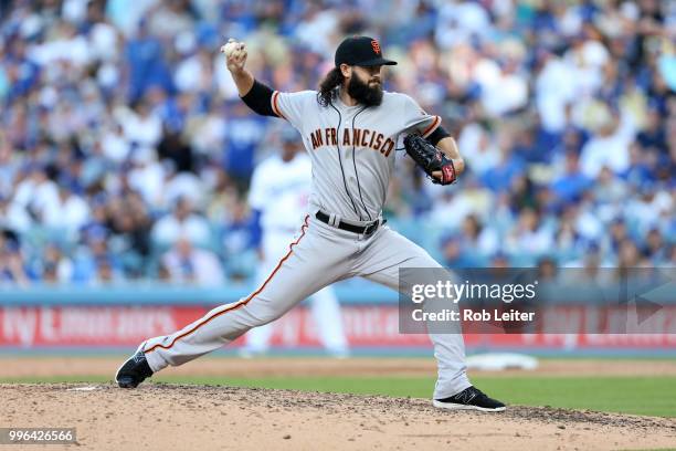 Cory Gearrin of the San Francisco Giants pitches during the game against the Los Angeles Dodgers at Dodger Stadium on Thursday, March 29, 2018 in Los...