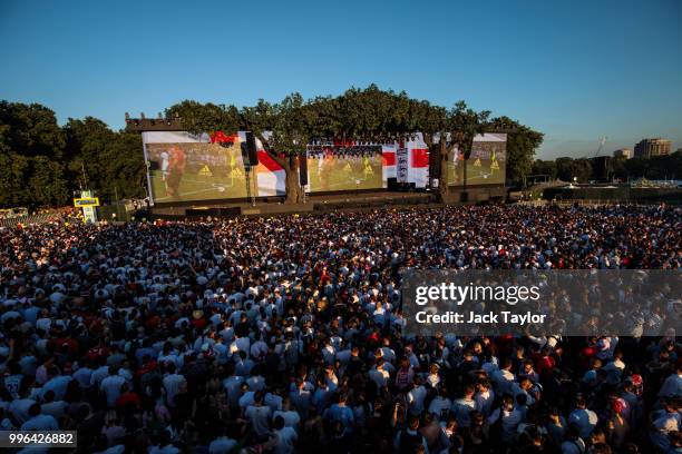 England football fans watch the Hyde Park screening of the FIFA 2018 World Cup semi-final match between Croatia and England on July 11, 2018 in...