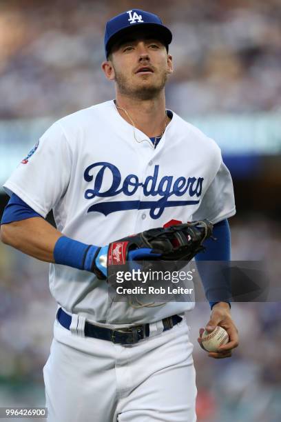 Cody Bellinger of the Los Angeles Dodgers looks on during the game against the San Francisco Giants at Dodger Stadium on Thursday, March 29, 2018 in...