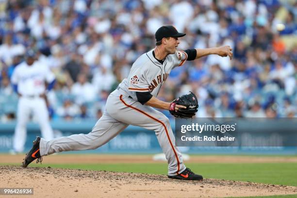 Tony Watson of the San Francisco Giants pitches during the game against the Los Angeles Dodgers at Dodger Stadium on Thursday, March 29, 2018 in Los...