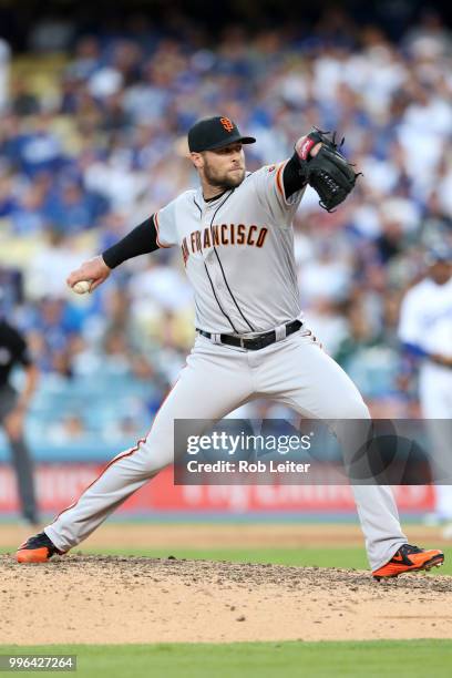 Hunter Strickland of the San Fransisco Giants pitches during the game against the Los Angeles Dodgers at Dodger Stadium on Thursday, March 29, 2018...