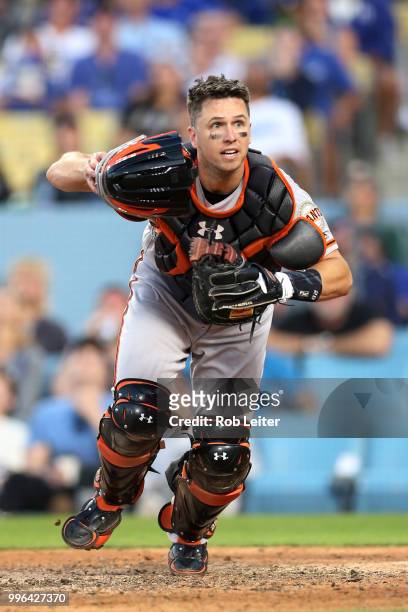 Buster Posey of the San Francisco Giants catches during the game against the Los Angeles Dodgers at Dodger Stadium on Thursday, March 29, 2018 in Los...