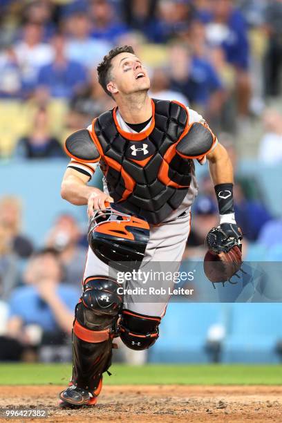 Buster Posey of the San Francisco Giants catches during the game against the Los Angeles Dodgers at Dodger Stadium on Thursday, March 29, 2018 in Los...