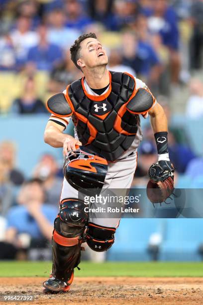 Buster Posey of the San Francisco Giants catches during the game against the Los Angeles Dodgers at Dodger Stadium on Thursday, March 29, 2018 in Los...