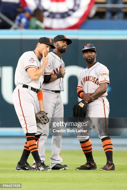 Hunter Pence, Austin Jackson and Andrew McCutchen of the San Francisco Giants strike a pose after winning the game against the San Francisco Giants...