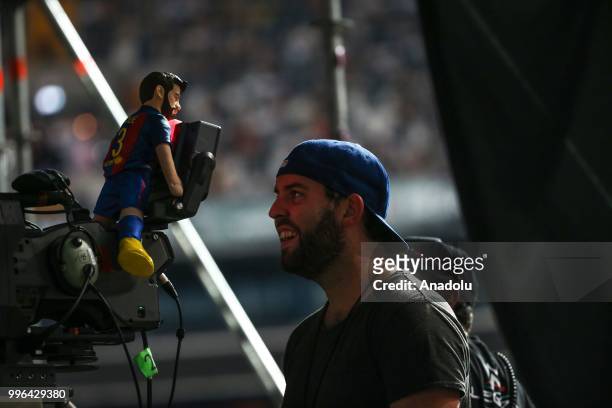 Cameraman films with a model of Shakira's husband Gerard Pique as she performs at Vodafone Park as part of her 6th world tour 'El Dorado' in...