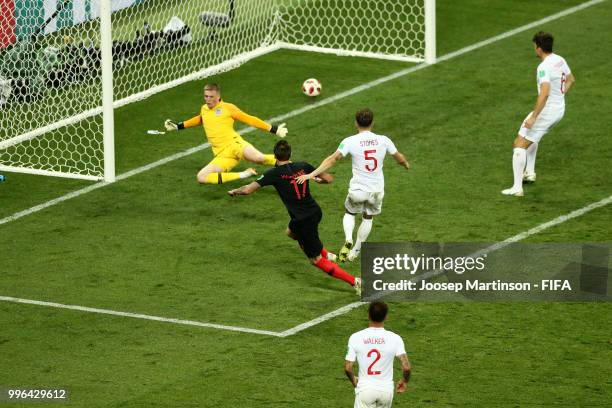 Mario Mandzukic of Croatia scores his team's second goal during the 2018 FIFA World Cup Russia Semi Final match between England and Croatia at...