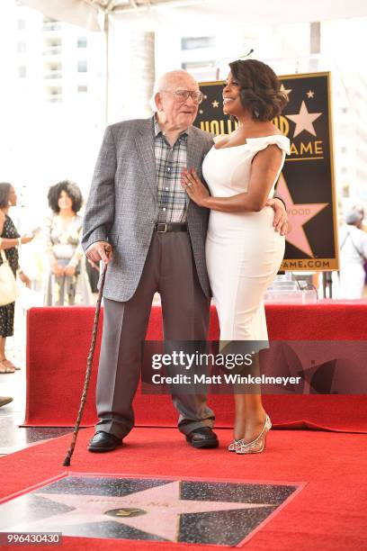 Niecy Nash and Ed Asner pose for a photo as Niecy Nash is honored with a star on the Hollywood Walk Of Fame on July 11, 2018 in Hollywood, California.