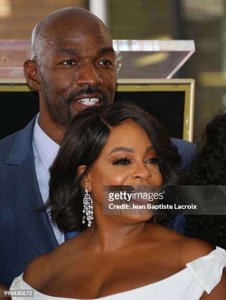 Niecy Nash and Jay Tucker attend a ceremony honoring her with Star on The Hollywood Walk Of Fame on July 11, 2018 in Los Angeles, California.