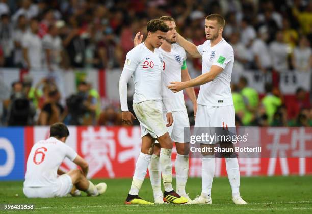 Dele Alli, Eric Dier and Harry Kane of England look dejected following their sides defeat in the 2018 FIFA World Cup Russia Semi Final match between...