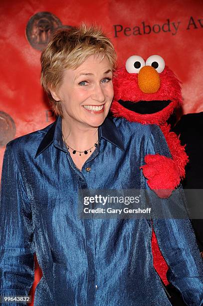 Actress Jane Lynch and Elmo attend the 69th Annual Peabody Awards at The Waldorf=Astoria on May 17, 2010 in New York City.