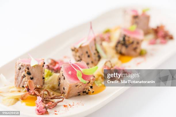 burned tuna with herbs - sila stock pictures, royalty-free photos & images