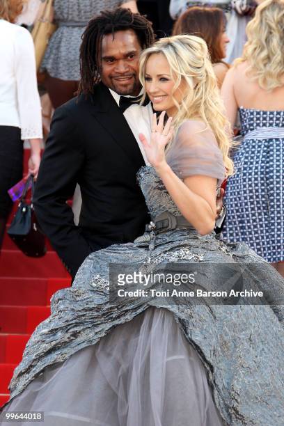Former footballer Christian Karembeu and model Adriana Karembeu attend the premiere of 'Biutiful' held at the Palais des Festivals during the 63rd...