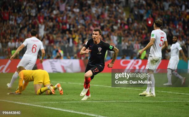 Mario Mandzukic of Croatia celebrates after scoring his team's second goal during the 2018 FIFA World Cup Russia Semi Final match between England and...