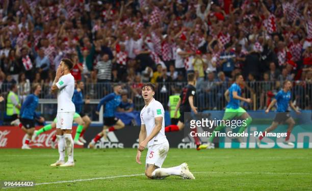 England's John Stones reacts after Croatia's Mario Mandzukic scores his side's second goal of the game during extra time during the FIFA World Cup,...