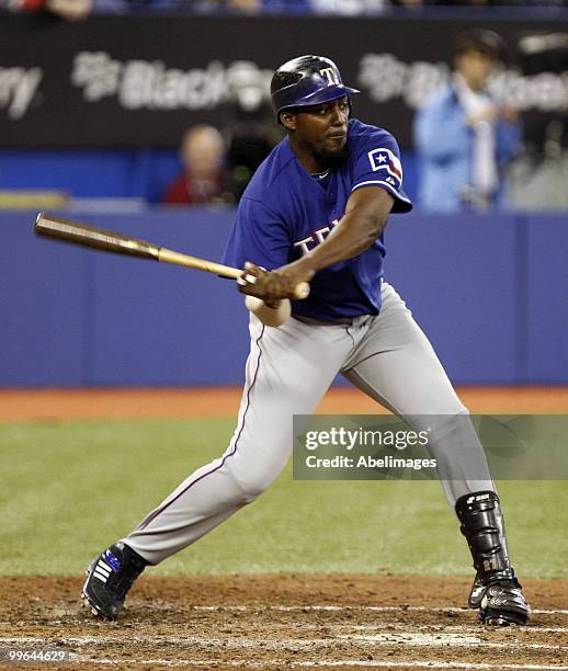 Vladimir Guerrero of the Texas Rangers swings at a pitch during a MLB game against the Toronto Blue Jays at the Rogers Centre May 15, 2010 in...