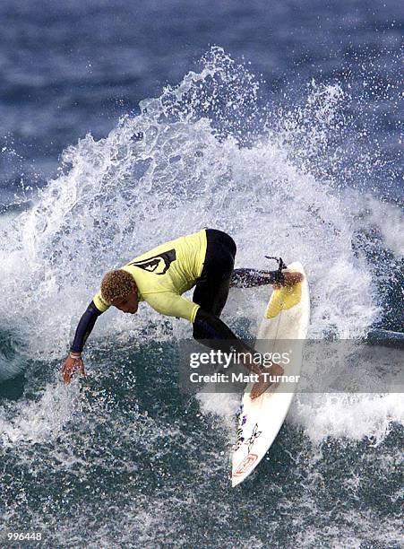 Beau Walker of Australia competes in the first round of the under 16 section during the Quicksilver World Grommet Surfing Titles being held at Avalon...