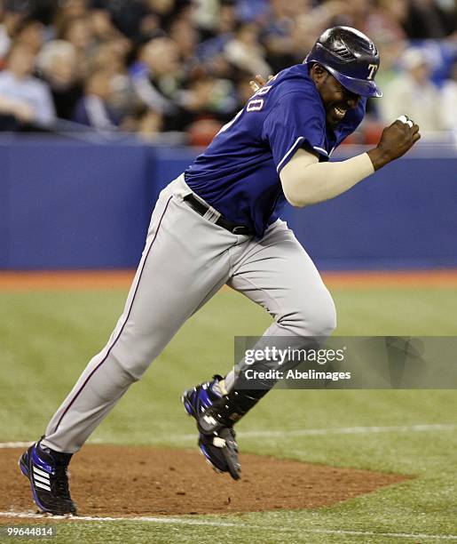 Vladimir Guerrero of the Texas Rangers runs after a hit during a MLB game against the Toronto Blue Jays at the Rogers Centre May 15, 2010 in Toronto,...