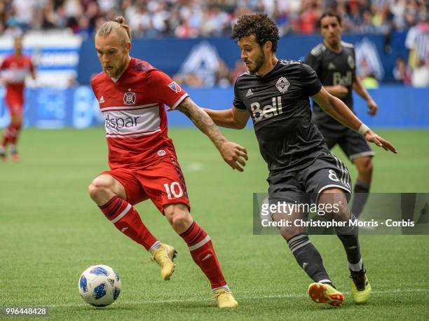 Aleksandar Katai of the Chicago Fire and Felipe Martins of the Vancouver Whitecaps FC at BC Place on July 7, 2018 in Vancouver, Canada.